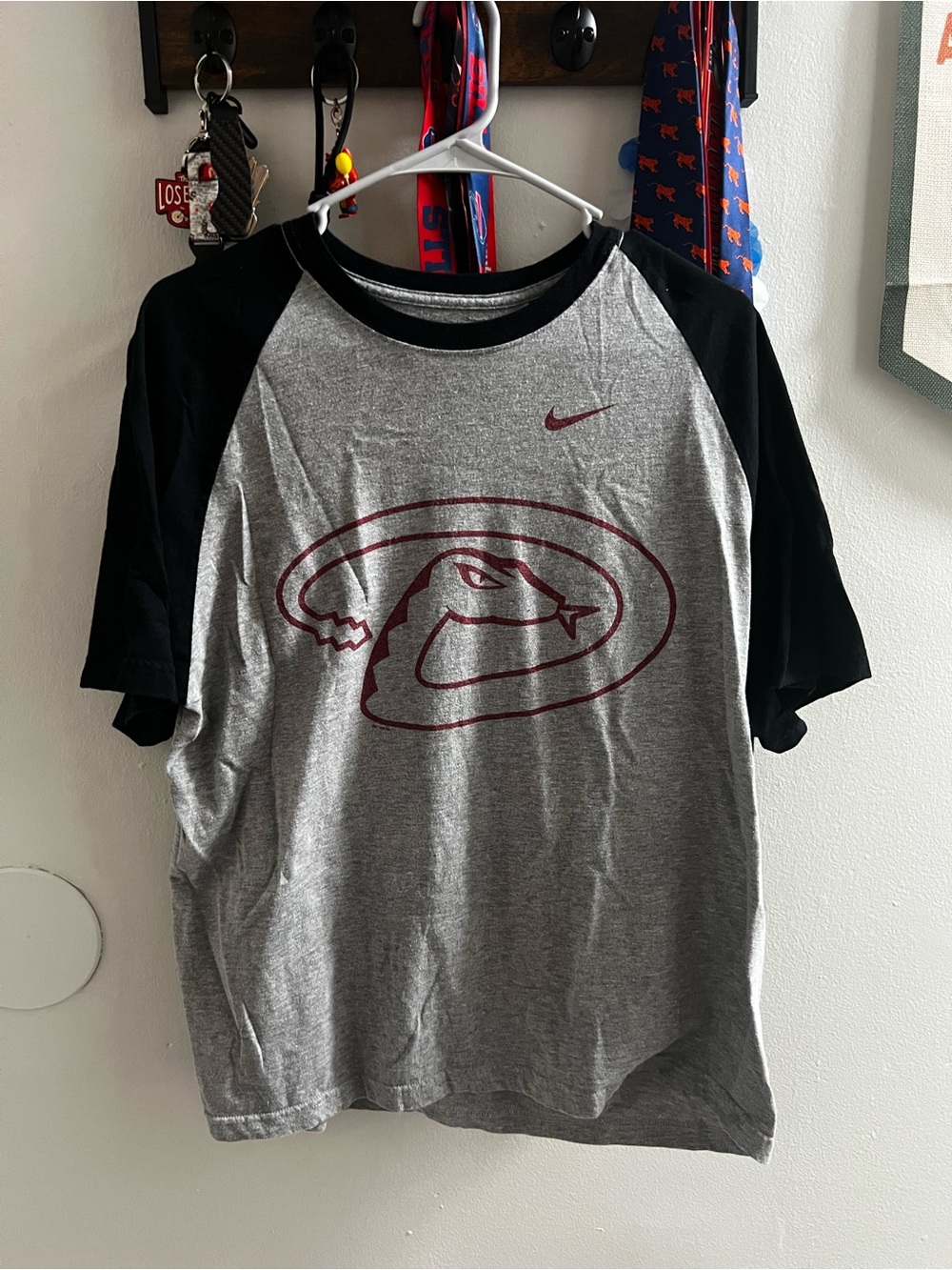 Nike Grey Tee with Black Raglan Sleeves and Maroon Diamondback Logo